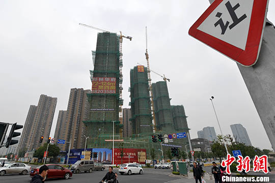 資料圖：一處在建中的商品房。 <a target='_blank' href='http://www.chinanews.com/'>中新社</a>記者 呂明 攝